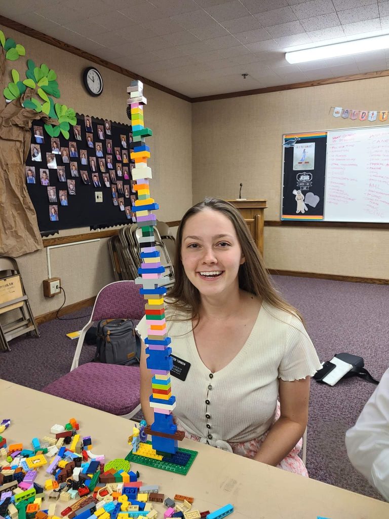 Me as an LDS Missionary with a LEGO tower